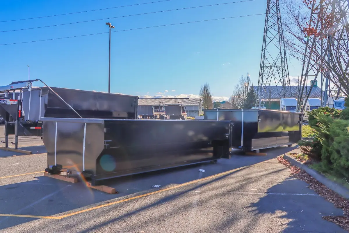 Roll-off dumpster ready for waste disposal at job site for Concrete Dumpster Rental in East Alton